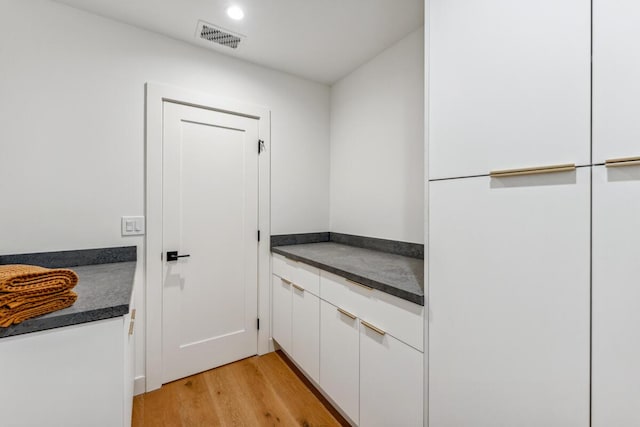 1412 Crestline Dr, Santa Barbara, CA 93105 - laundry room featuring light wood-type flooring and recessed lighting