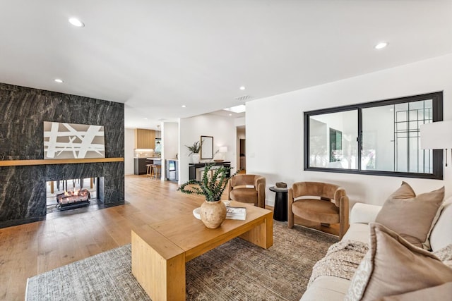 1412 Crestline Dr, Santa Barbara, CA 93105 - living room featuring wood finished floors, recessed lighting, and a multi sided fireplace