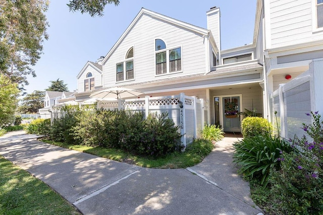 4515 Carpinteria Ave Unit G, Carpinteria, CA 93013 - view of front of house featuring a chimney