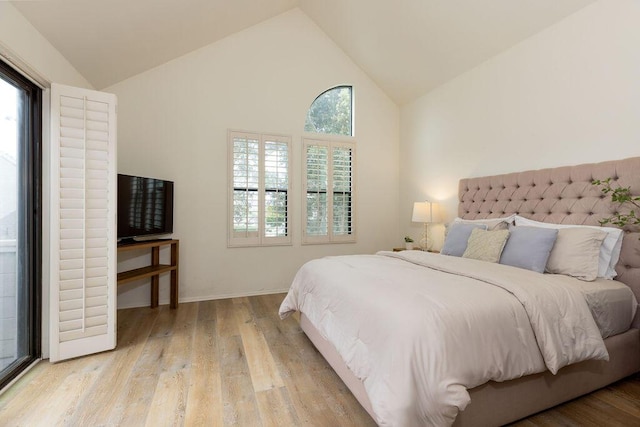 4515 Carpinteria Ave Unit G, Carpinteria, CA 93013 - bedroom featuring light wood-type flooring and high vaulted ceiling