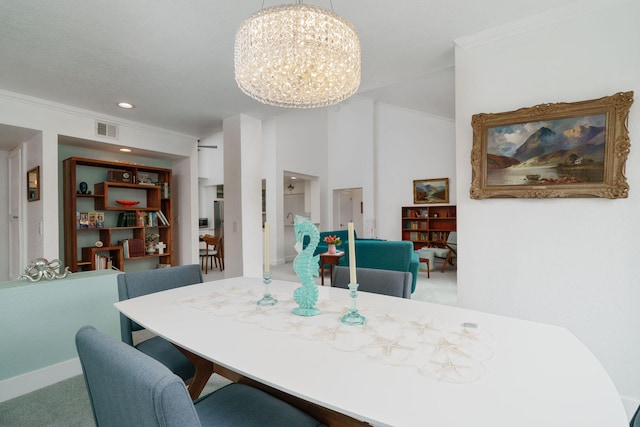 2206 Martinique Ln, Oxnard, CA 93035 - carpeted dining room with a chandelier, crown molding, and recessed lighting