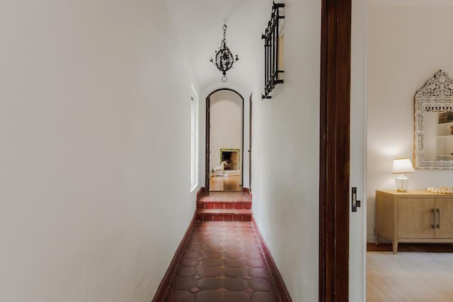 405 Toro Canyon Rd, Carpinteria, CA 93013 - hall with arched walkways and tile patterned floors