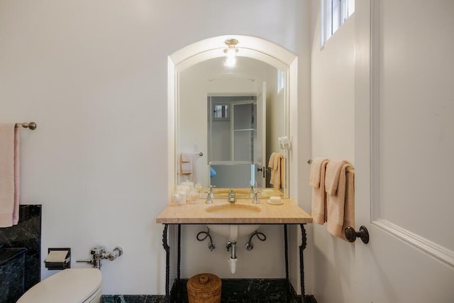 405 Toro Canyon Rd, Carpinteria, CA 93013 - half bathroom featuring a sink and toilet