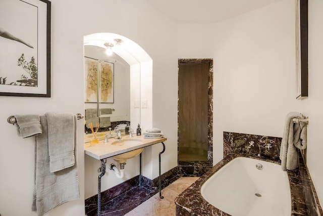 405 Toro Canyon Rd, Carpinteria, CA 93013 - bathroom with a bath, marble finish flooring, and a shower