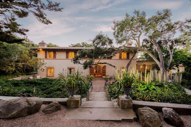 405 Toro Canyon Rd, Carpinteria, CA 93013 - mediterranean / spanish house with french doors and stucco siding
