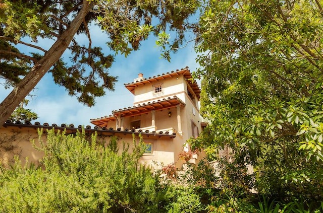 405 Toro Canyon Rd, Carpinteria, CA 93013 - view of home's exterior with stucco siding