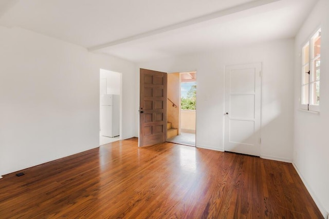 405 Toro Canyon Rd, Carpinteria, CA 93013 - unfurnished bedroom featuring freestanding refrigerator and wood finished floors