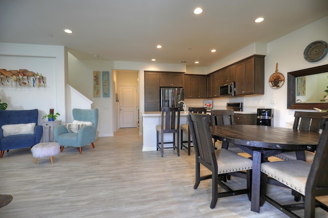 6607 Fathom Way, Goleta, CA 93117 - dining space with recessed lighting and light wood-style floors