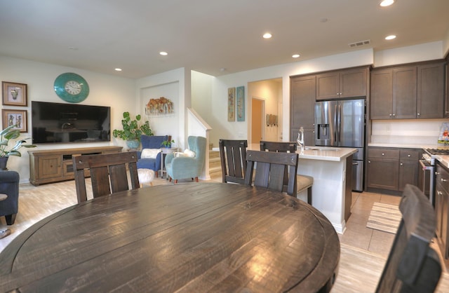 6607 Fathom Way, Goleta, CA 93117 - dining area featuring recessed lighting and stairway