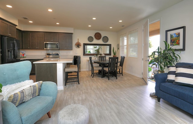 6607 Fathom Way, Goleta, CA 93117 - living room with light wood finished floors and recessed lighting