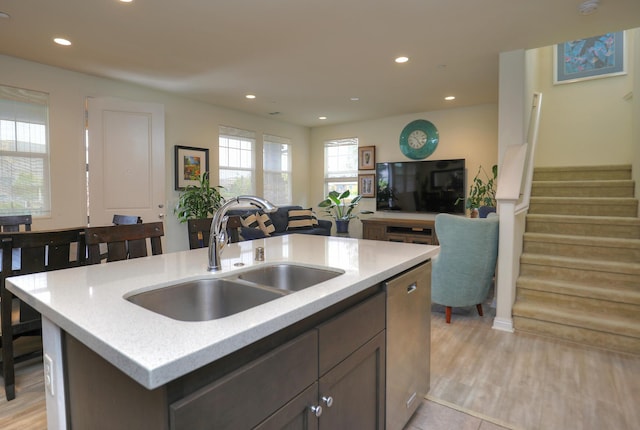 6607 Fathom Way, Goleta, CA 93117 - kitchen featuring open floor plan, dishwasher, recessed lighting, a center island with sink, and light wood-style flooring