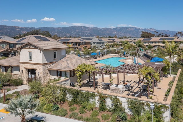 6607 Fathom Way, Goleta, CA 93117 - aerial perspective of suburban area with a mountainous background and a pool