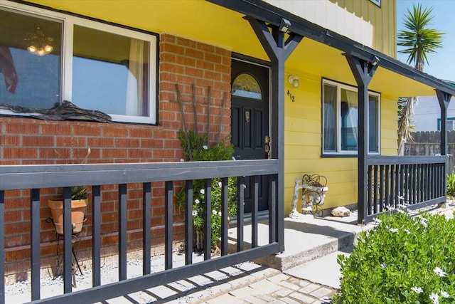 412 Milky Way, Lompoc, CA 93436 - view of exterior entry featuring a porch and brick siding