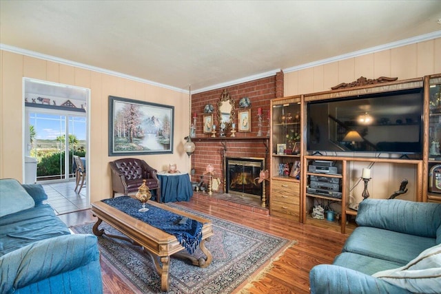 412 Milky Way, Lompoc, CA 93436 - living area featuring crown molding, wood finished floors, and a brick fireplace