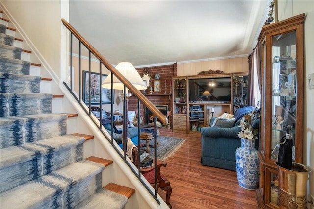 412 Milky Way, Lompoc, CA 93436 - stairway with wood finished floors, plenty of natural light, and ornamental molding