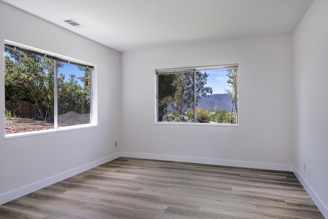 740 Alisal Rd, Solvang, CA 93463 - empty room with healthy amount of natural light and wood finished floors