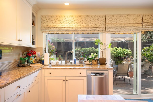 23 La Cumbre Cir, Santa Barbara, CA 93105 - kitchen featuring stainless steel dishwasher, white cabinets, tasteful backsplash, recessed lighting, and plenty of natural light