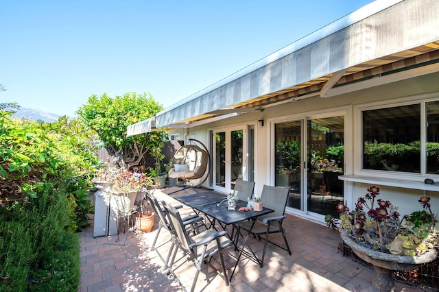 23 La Cumbre Cir, Santa Barbara, CA 93105 - view of patio featuring french doors and outdoor dining space