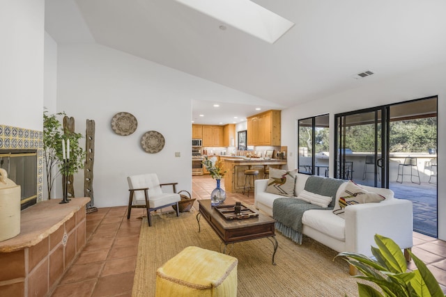 80 Bobcat Springs Rd, Buellton, CA 93427 - living area with high vaulted ceiling, a skylight, recessed lighting, and light tile patterned floors