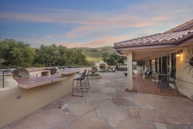 80 Bobcat Springs Rd, Buellton, CA 93427 - view of patio featuring an outdoor kitchen, an outdoor bar, and a mountain view