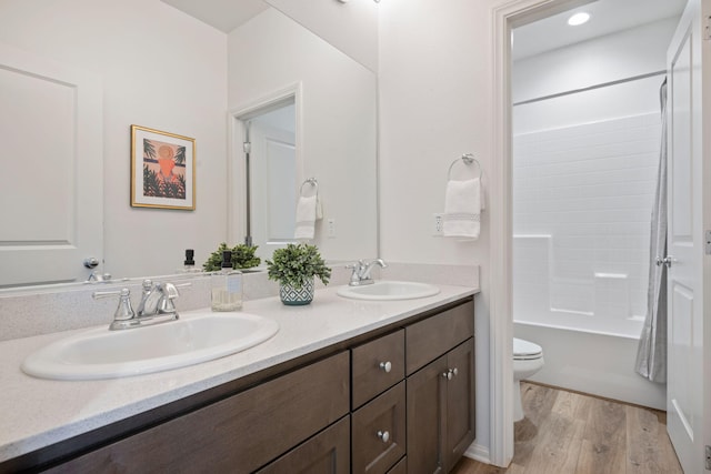 6594 Pipeline Pl, Goleta, CA 93117 - full bath with double vanity, wood finished floors, and shower / bathtub combination with curtain
