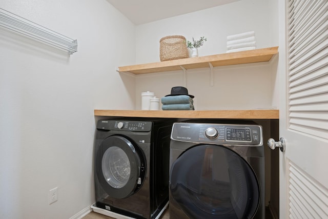 6594 Pipeline Pl, Goleta, CA 93117 - laundry area featuring washer and dryer and baseboards