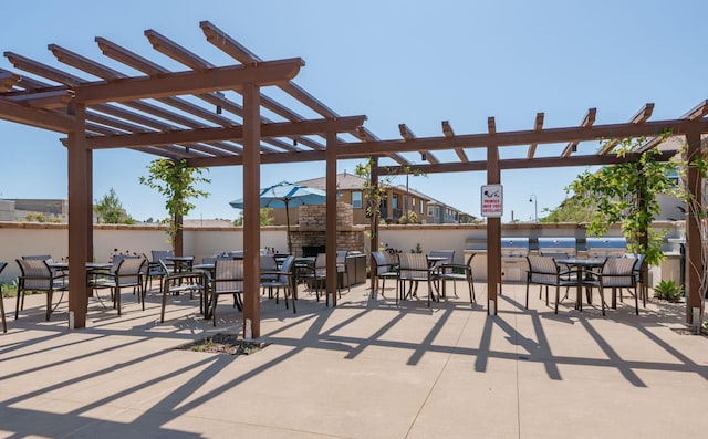 6594 Pipeline Pl, Goleta, CA 93117 - view of patio / terrace with a pergola and outdoor dining space