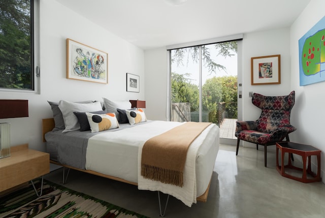 1944 Eucalyptus Hill Rd, Santa Barbara, CA 93108 - bedroom featuring access to exterior and finished concrete flooring