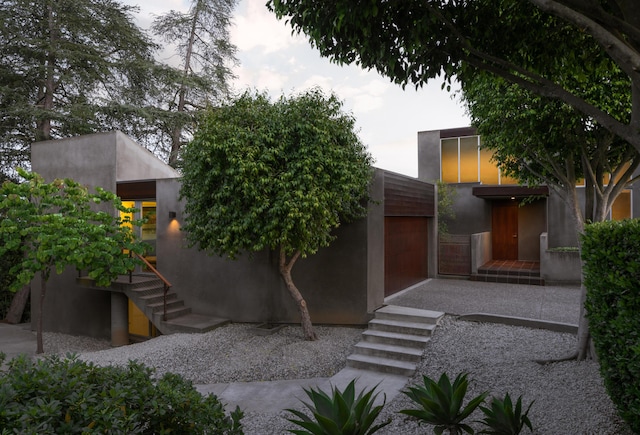 1944 Eucalyptus Hill Rd, Santa Barbara, CA 93108 - view of front of property with stairway and stucco siding