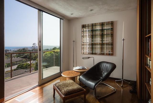 1944 Eucalyptus Hill Rd, Santa Barbara, CA 93108 - sitting room with healthy amount of natural light, wood finished floors, and a desk