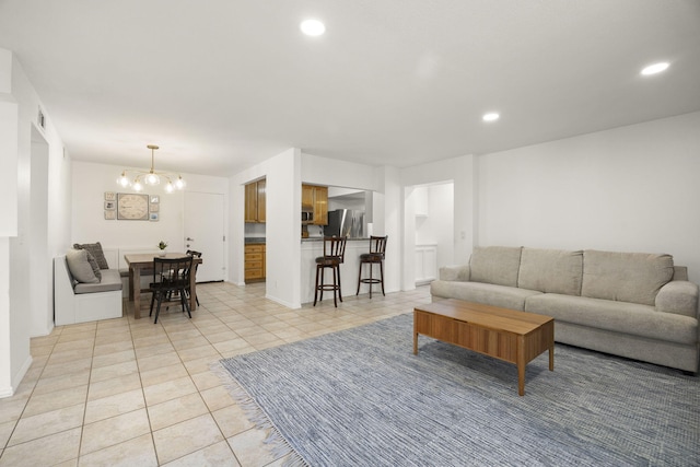2171 Martinique Ln, Oxnard, CA 93035 - living room featuring a chandelier, light tile patterned floors, and recessed lighting