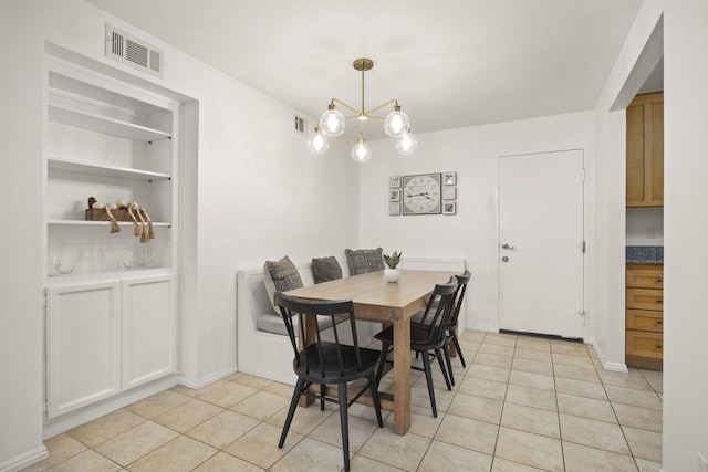 2171 Martinique Ln, Oxnard, CA 93035 - dining space featuring light tile patterned floors and a chandelier