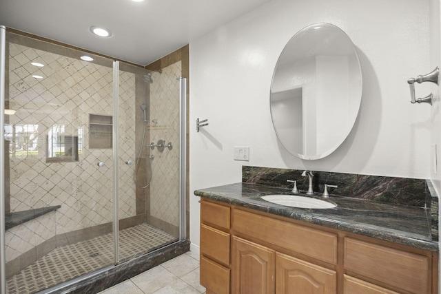 2171 Martinique Ln, Oxnard, CA 93035 - full bathroom with tile patterned flooring, vanity, a shower stall, and recessed lighting