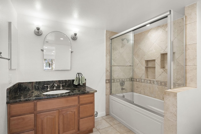 2171 Martinique Ln, Oxnard, CA 93035 - full bath with vanity, tile patterned floors, and enclosed tub / shower combo