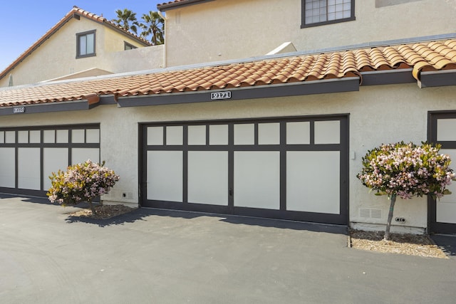 2171 Martinique Ln, Oxnard, CA 93035 - view of front facade featuring a tile roof and stucco siding