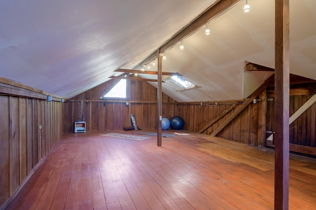 435 E Pedregosa St, Santa Barbara, CA 93101 - additional living space featuring wood walls, wood-type flooring, and lofted ceiling