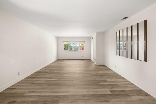 886 Raddue Ave, Santa Barbara, CA 93111 - empty room featuring baseboards and wood finished floors