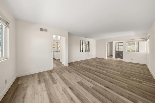 886 Raddue Ave, Santa Barbara, CA 93111 - unfurnished living room featuring light wood-style flooring and baseboards