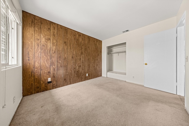 886 Raddue Ave, Santa Barbara, CA 93111 - unfurnished bedroom featuring carpet flooring, wood walls, and a closet