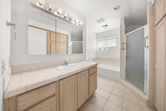 886 Raddue Ave, Santa Barbara, CA 93111 - full bathroom with vanity, a garden tub, tile patterned flooring, and a stall shower