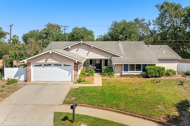 886 Raddue Ave, Santa Barbara, CA 93111 - view of front of house with an attached garage, driveway, a shingled roof, and brick siding