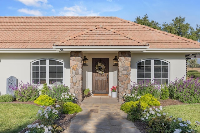 1740 Still Meadow Rd, Solvang, CA 93463 - doorway to property with a tile roof, stucco siding, and stone siding