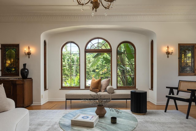 205 S Lomita Ave, Ojai, CA 93023 - living room featuring arched walkways, a chandelier, and wood finished floors