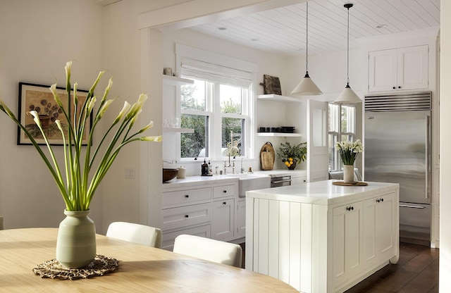 602 Parra Grande Ln, Montecito, CA 93108 - kitchen with stainless steel appliances, open shelves, light countertops, white cabinetry, and wooden ceiling