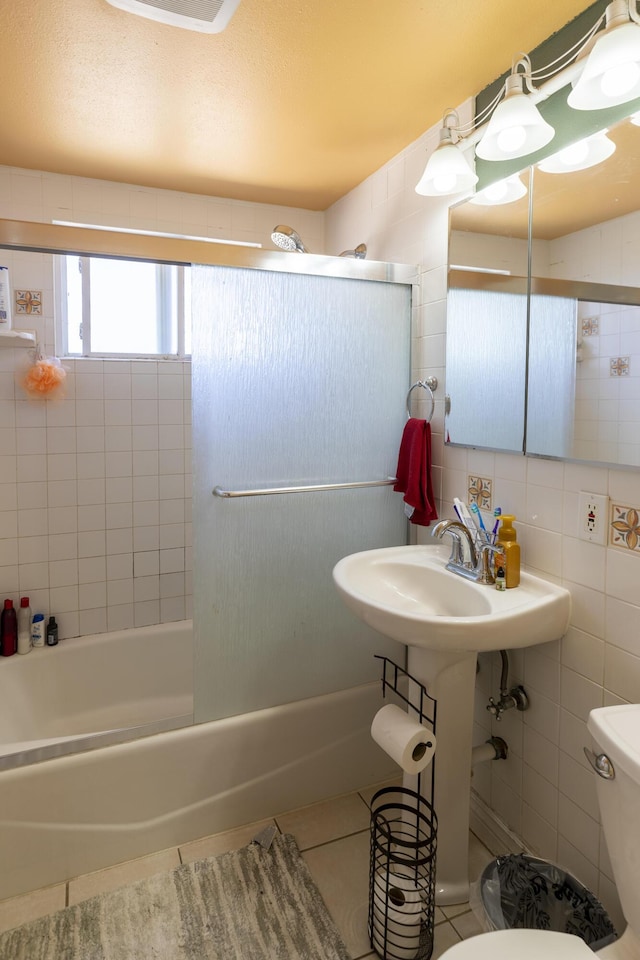 3608 Via Orilla, Lompoc, CA 93436 - bathroom featuring tile patterned floors, bathtub / shower combination, and tile walls