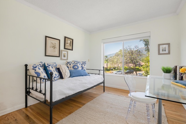 2727 Miradero Dr Unit 209, Santa Barbara, CA 93105 - bedroom featuring wood finished floors and ornamental molding