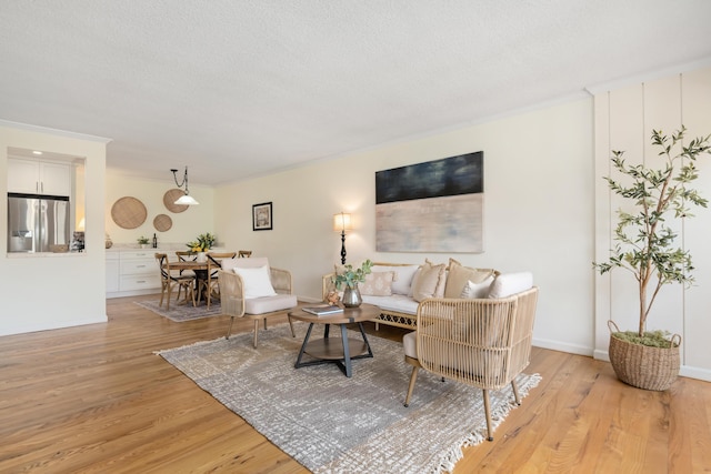 2727 Miradero Dr Unit 209, Santa Barbara, CA 93105 - living area featuring light wood finished floors and a textured ceiling