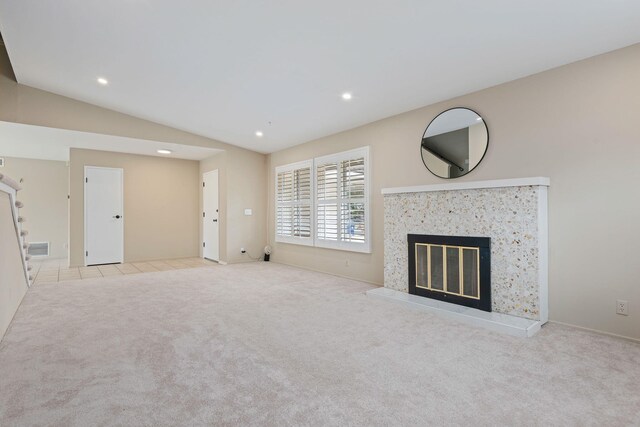 622 Colfax Ct, Goleta, CA 93117 - unfurnished living room featuring carpet floors, a high end fireplace, recessed lighting, and vaulted ceiling