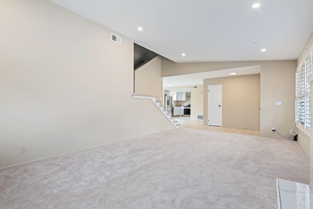 622 Colfax Ct, Goleta, CA 93117 - unfurnished living room featuring light colored carpet, recessed lighting, and stairway