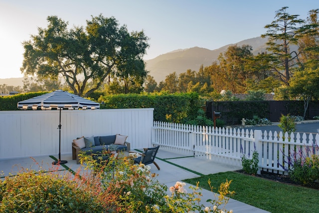 251 Cloydon Cir, Montecito, CA 93108 - fenced backyard with a mountain view, an outdoor living space, and a patio area